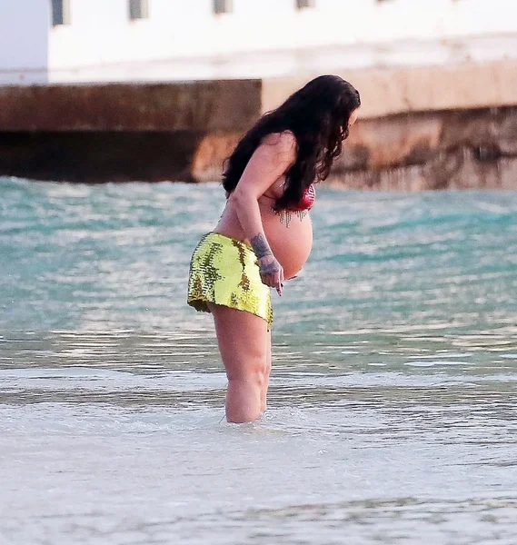 Rihanna-naked-topless-porn-bikini-feet-sexy-ass-tits-pussy-pregnant-bikini-beach-ScandalPlanet-10-optimized.webp