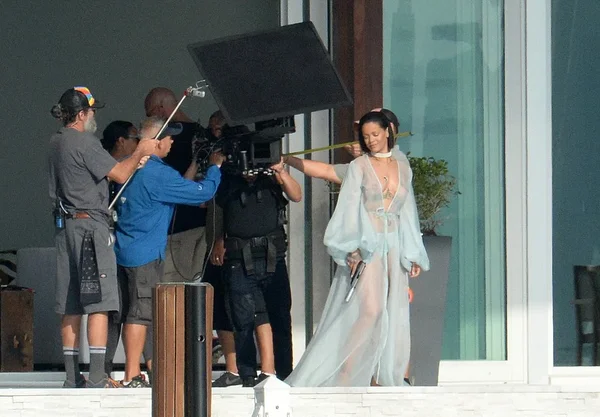 rihanna-filming-music-video-with-naked-boobs-optimized.webp