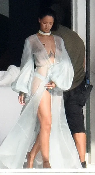 rihanna-walking-out-of-house-with-naked-boobs-optimized.webp